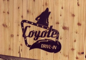 Coyote Drive-In logo on wood