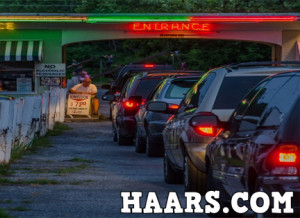 Line of cars waiting to get in at Haars Drive-In